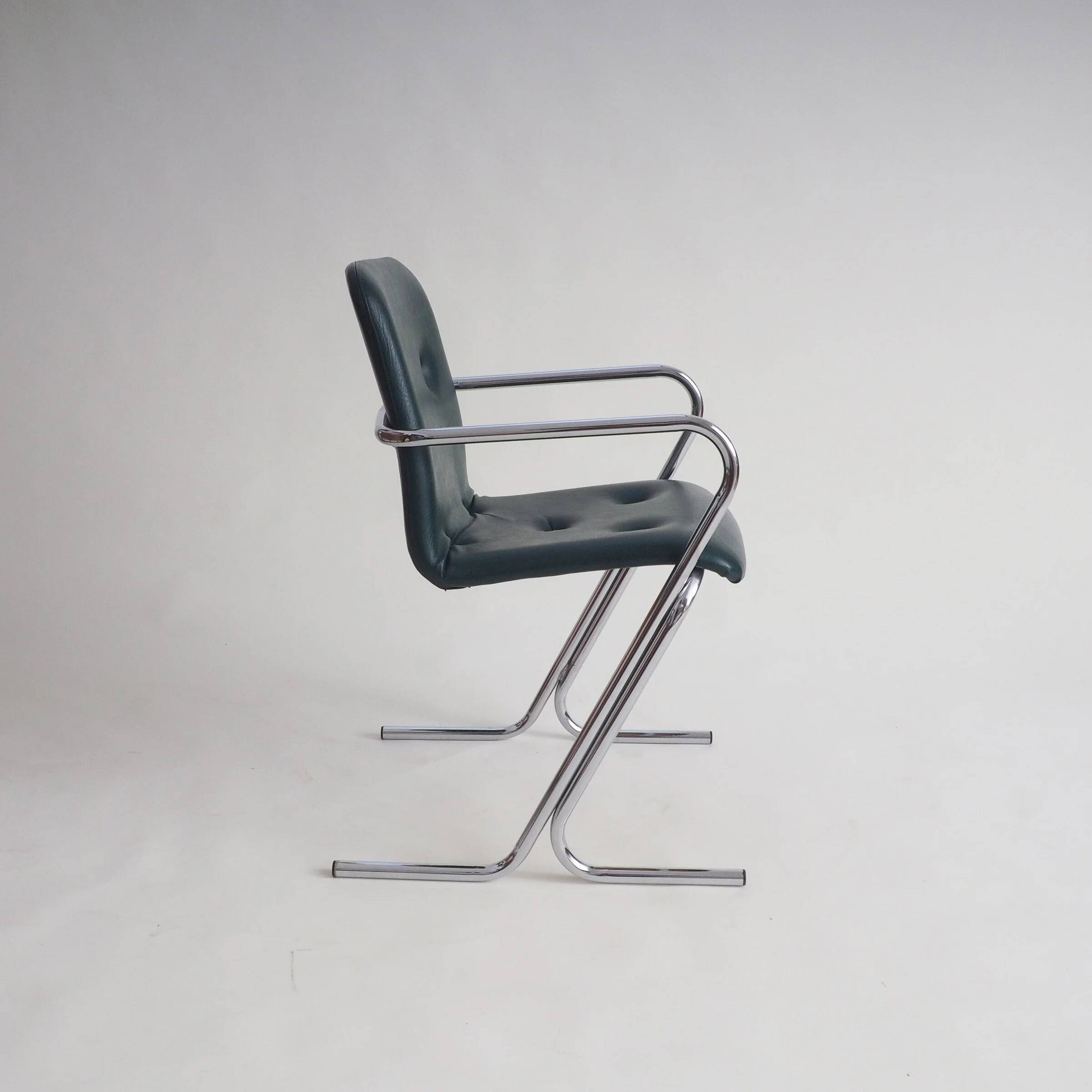 70s tubular arm chair by Tavo