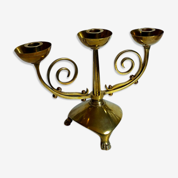 Candlestick candle holder with three legs in old solid brass