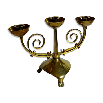 Candlestick candle holder with three legs in old solid brass