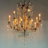 Gilt bronze cage chandelier decorated with glass pendants in the shape of peacock feathers circa 1800