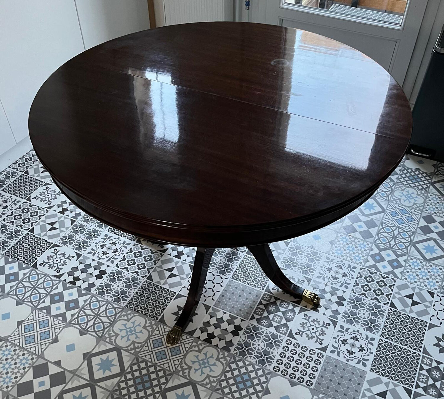 Empire-style table in solid walnut.