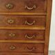 Antique marquetry commode in the Louis XVI style.