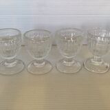 Four old molded glass shells