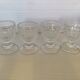 Four old molded glass shells