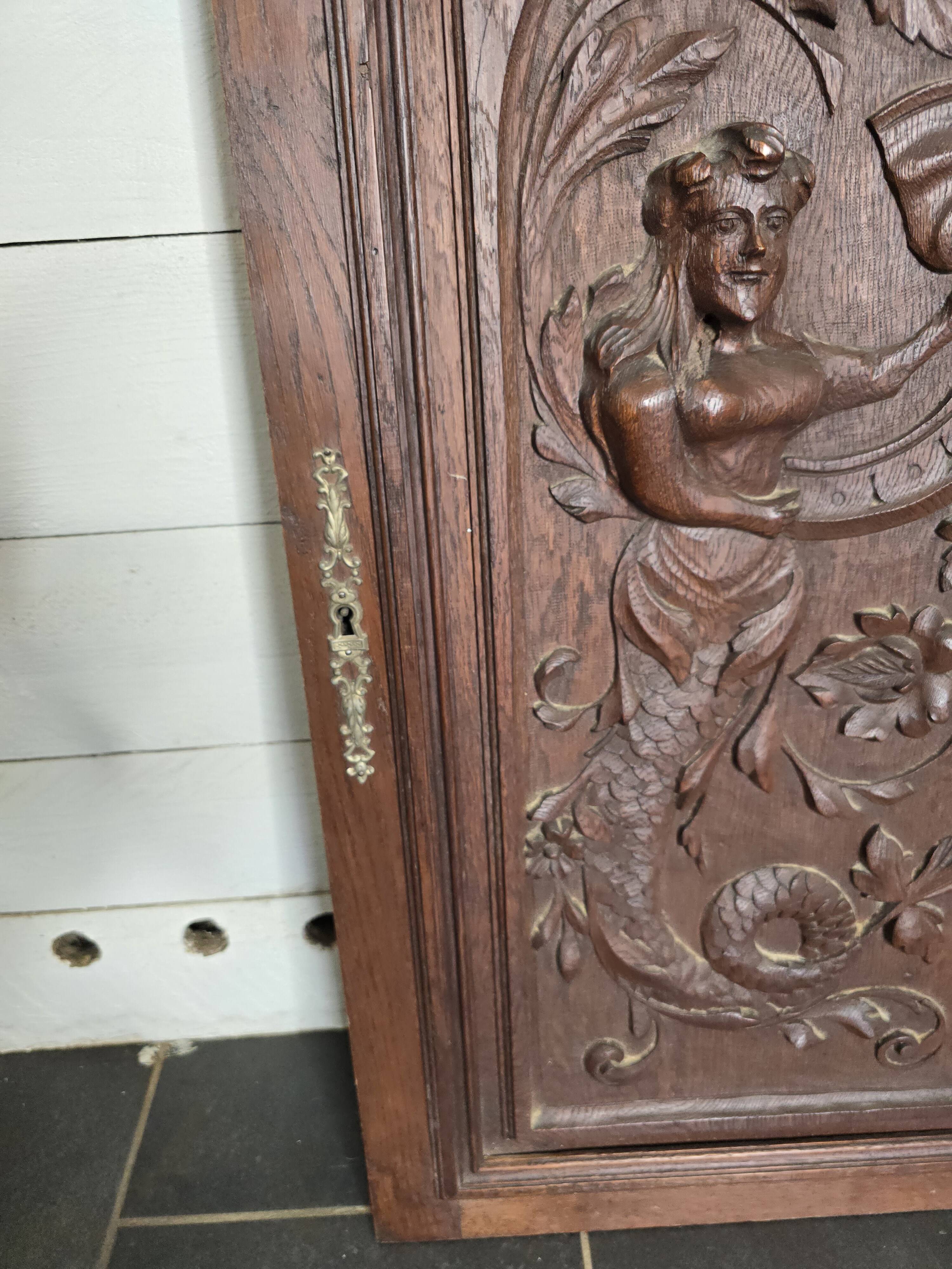 Old carved oak wooden door