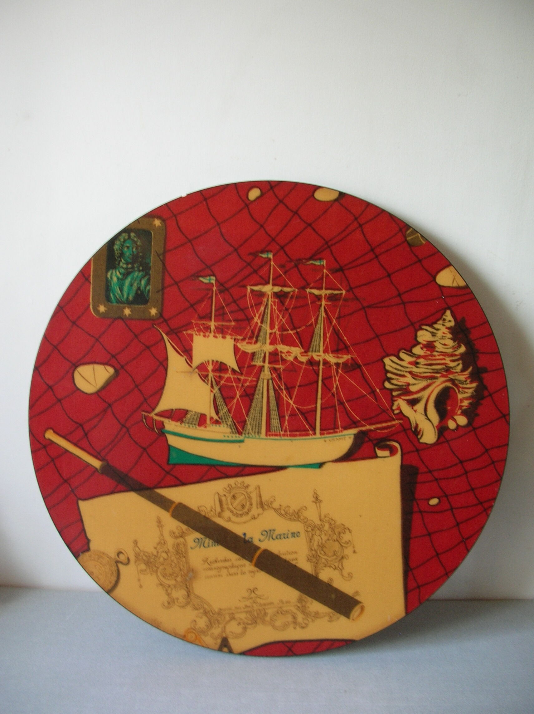 Jean Clemmer's old tripod bistro table in the 1950s/60s marine décor