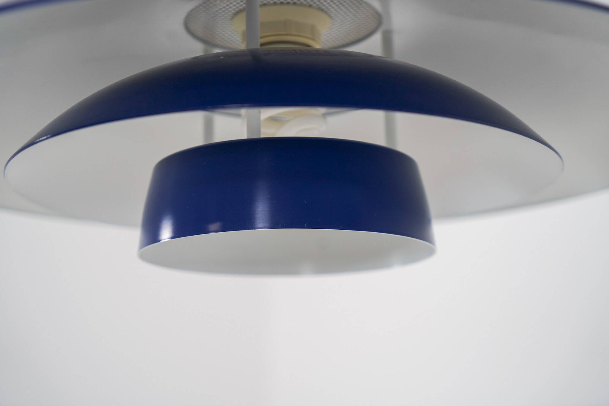 Elegant blue pendant light by Belux