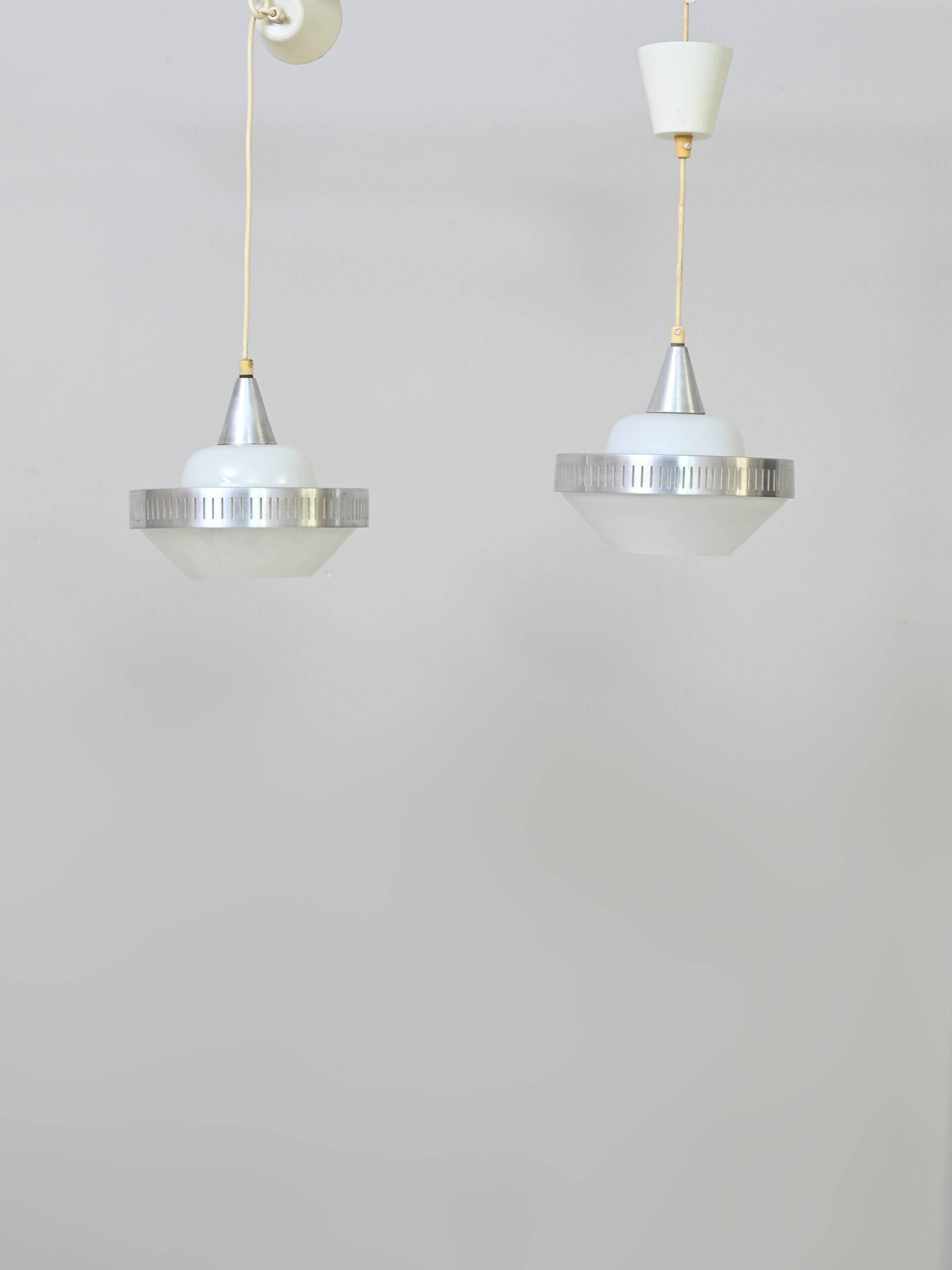 Glass and metal pendant lamps