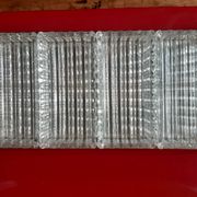 Service platter for aperitifs with four compartments in cut glass.