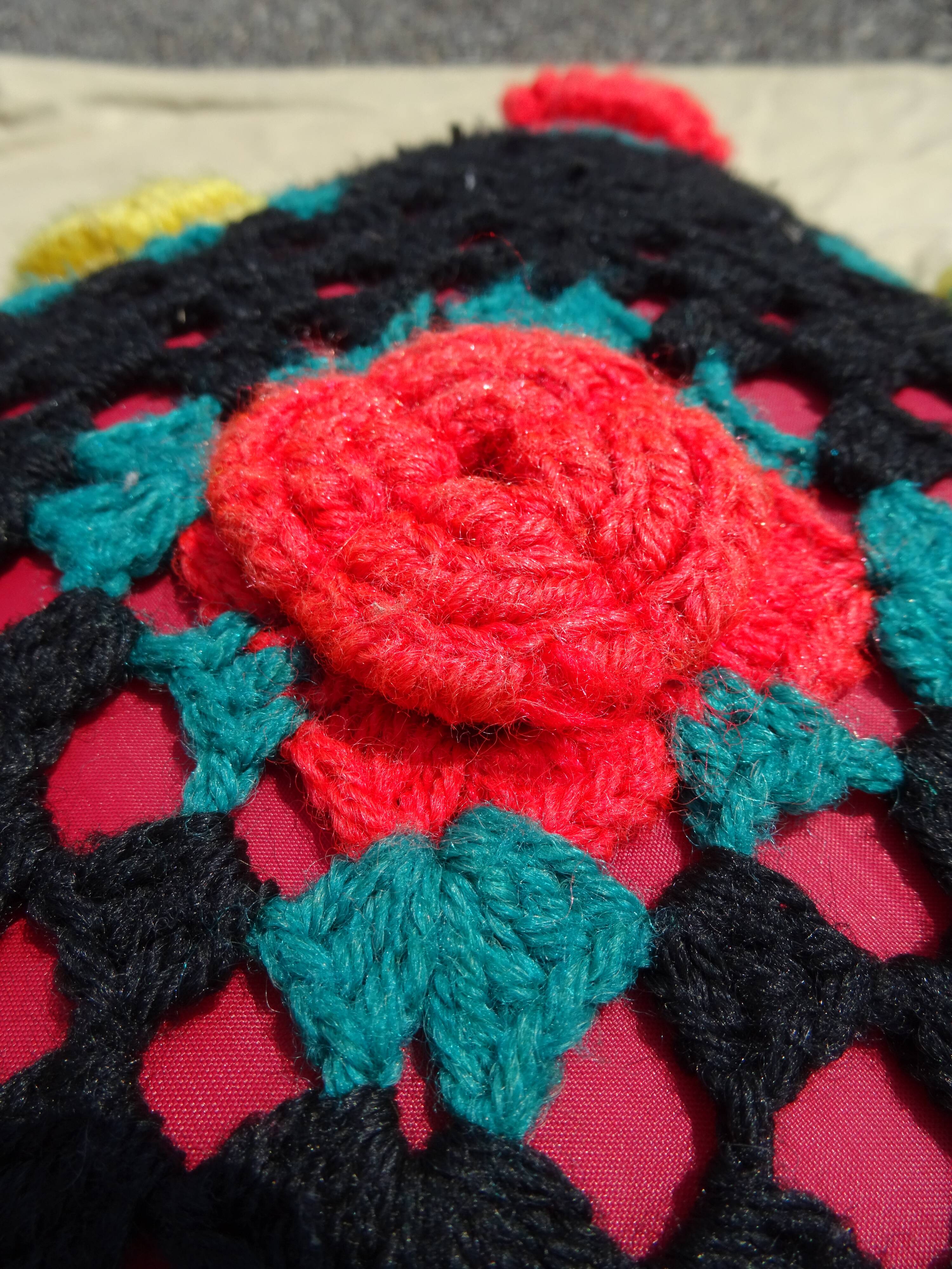 Wool cushion with vintage crochet