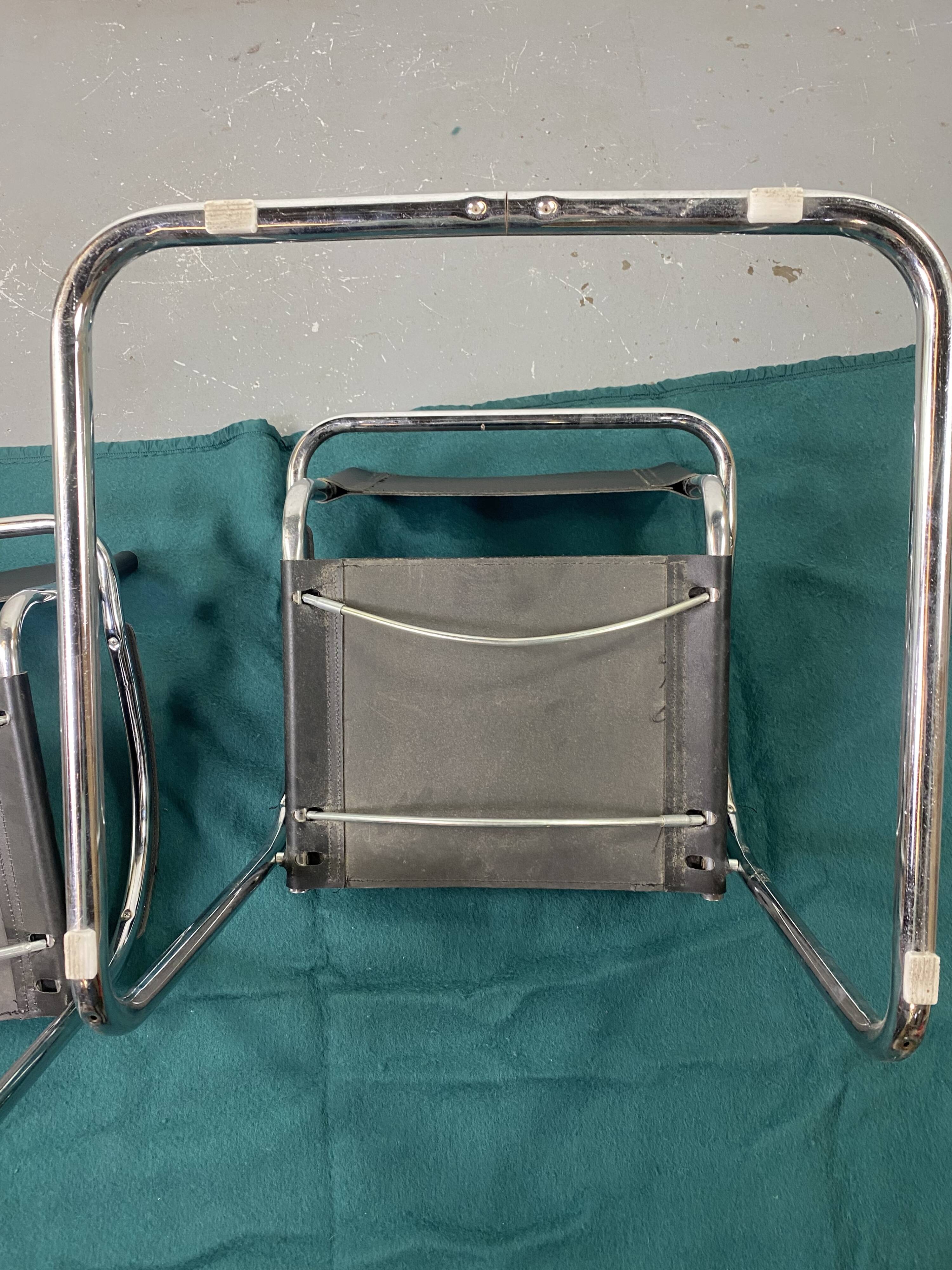 Pair of design armchairs in imitation leather chrome