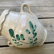 Ancient orza from Lucena, Córdoba, glazed Andalusian pottery with a veined decoration.