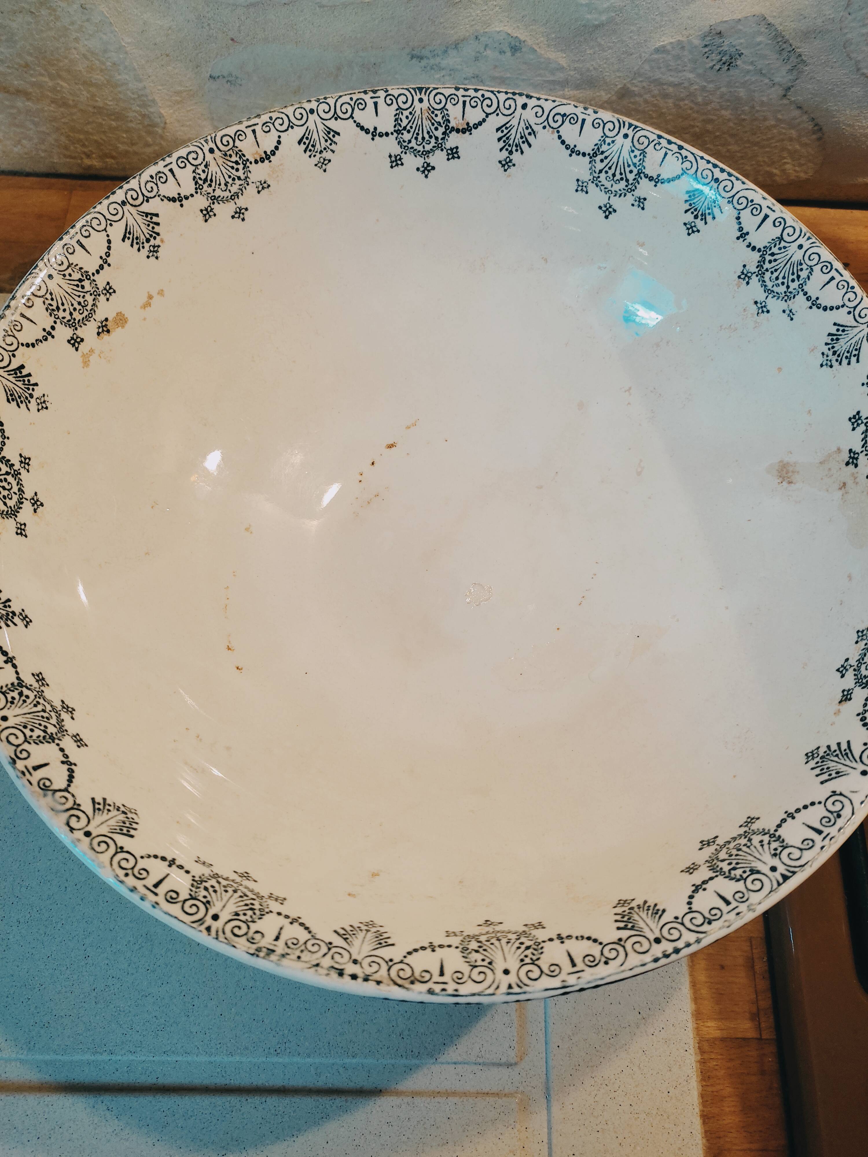 Old bowl in pedestic tiles