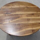 Round drop-leaf table made entirely of solid walnut
