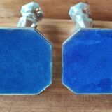 Pair of old silver metal candlesticks