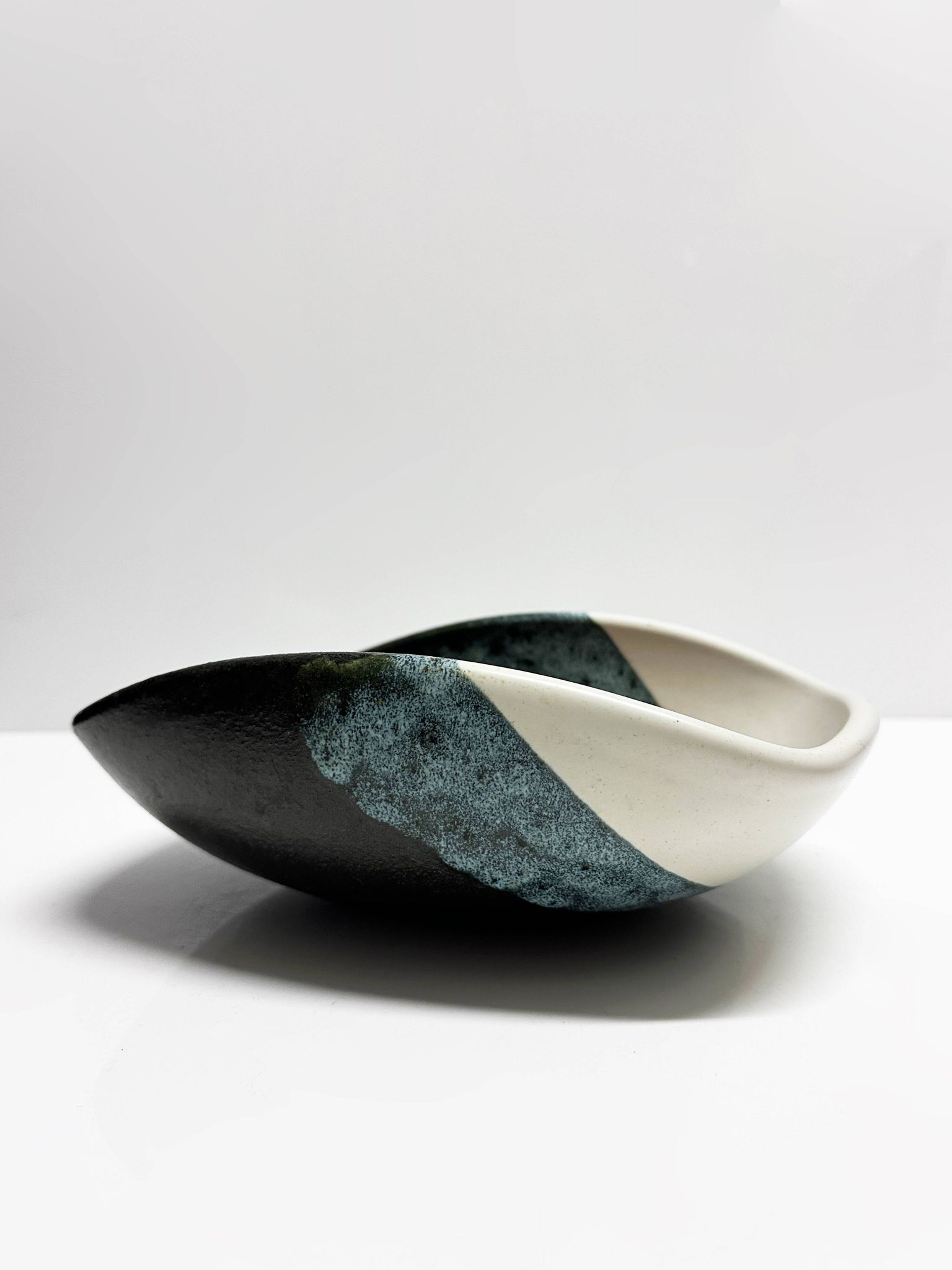 Rare set of three Elchinger Atelier ceramic bowls. France, 1950.