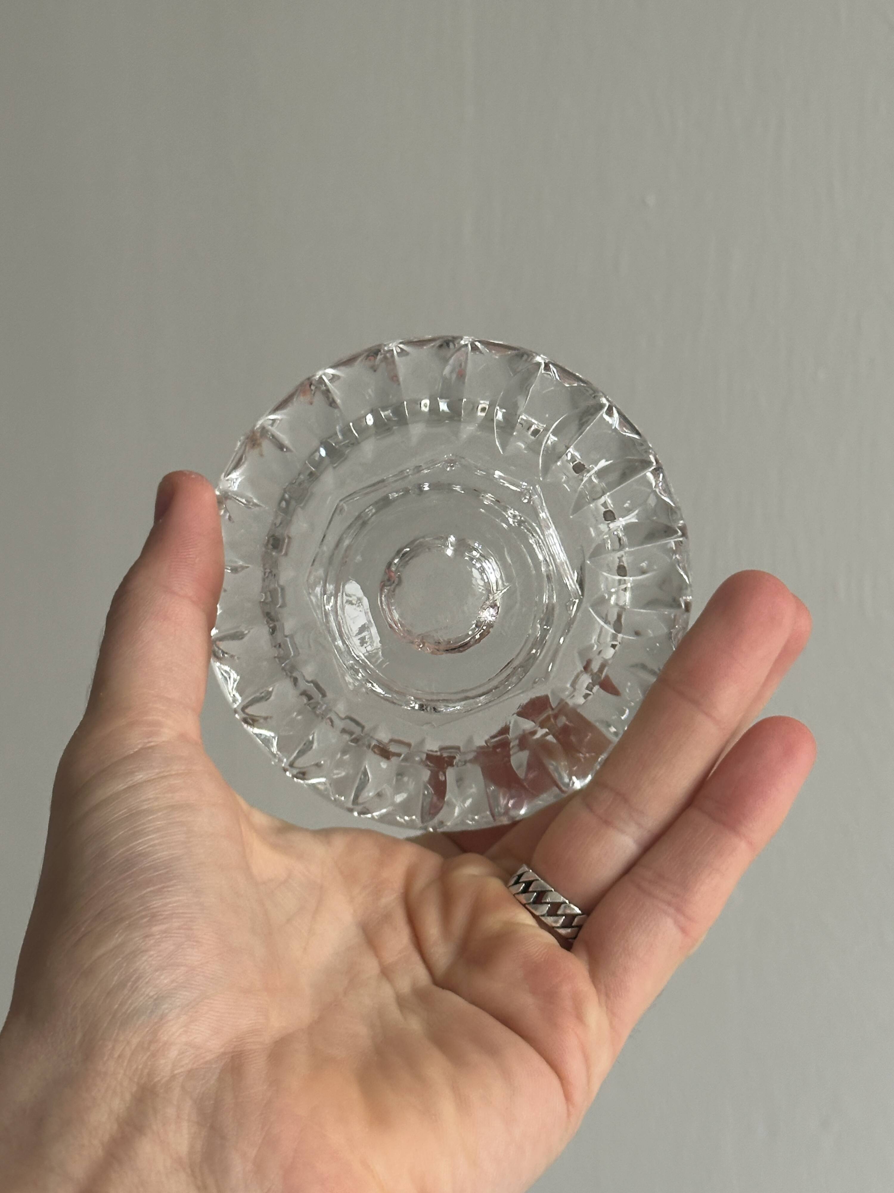 Duo of small candlesticks in chiseled glass