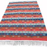Authentic handmade Tunisian Berber kilim rug in orange wool.