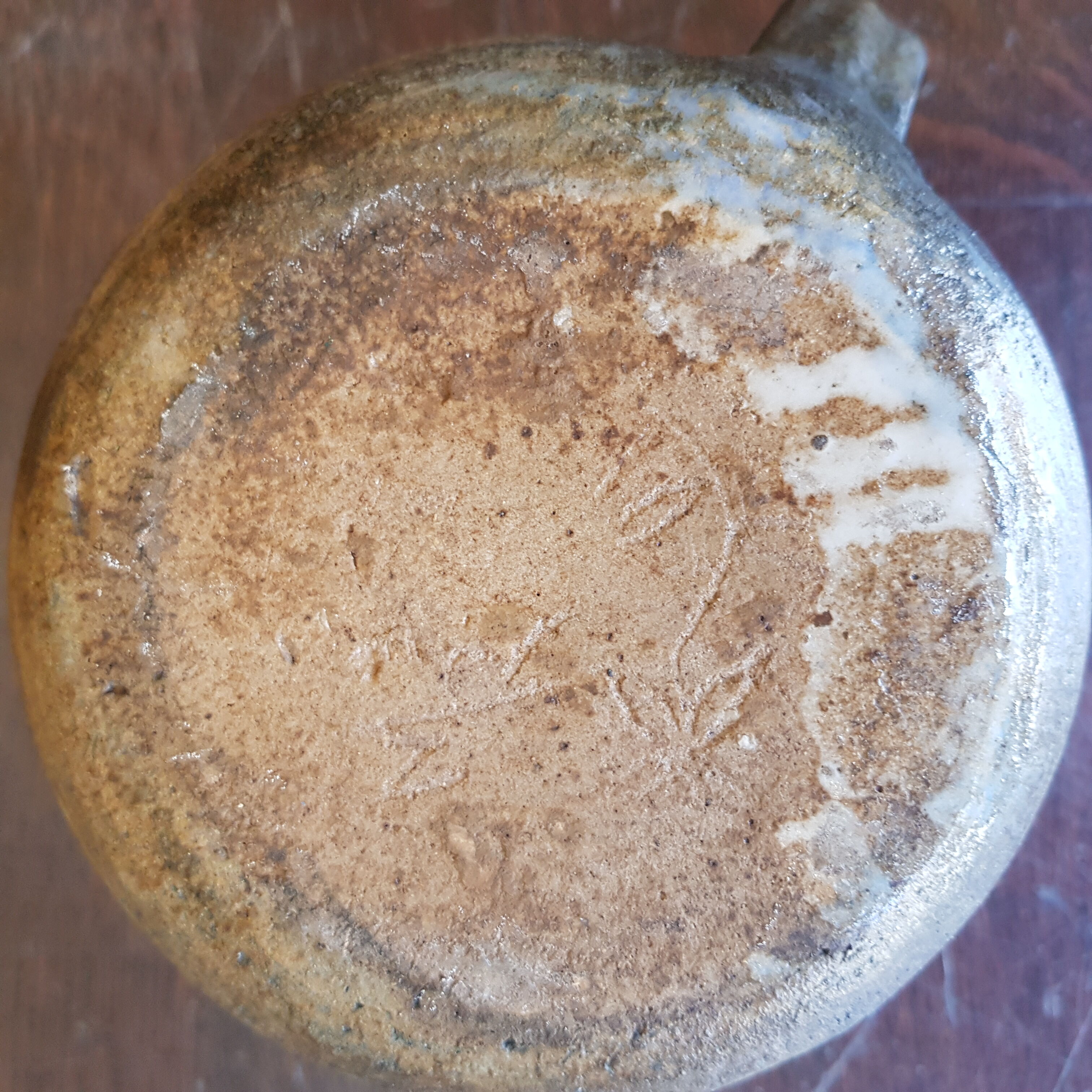 Pitcher in ancient sandstone