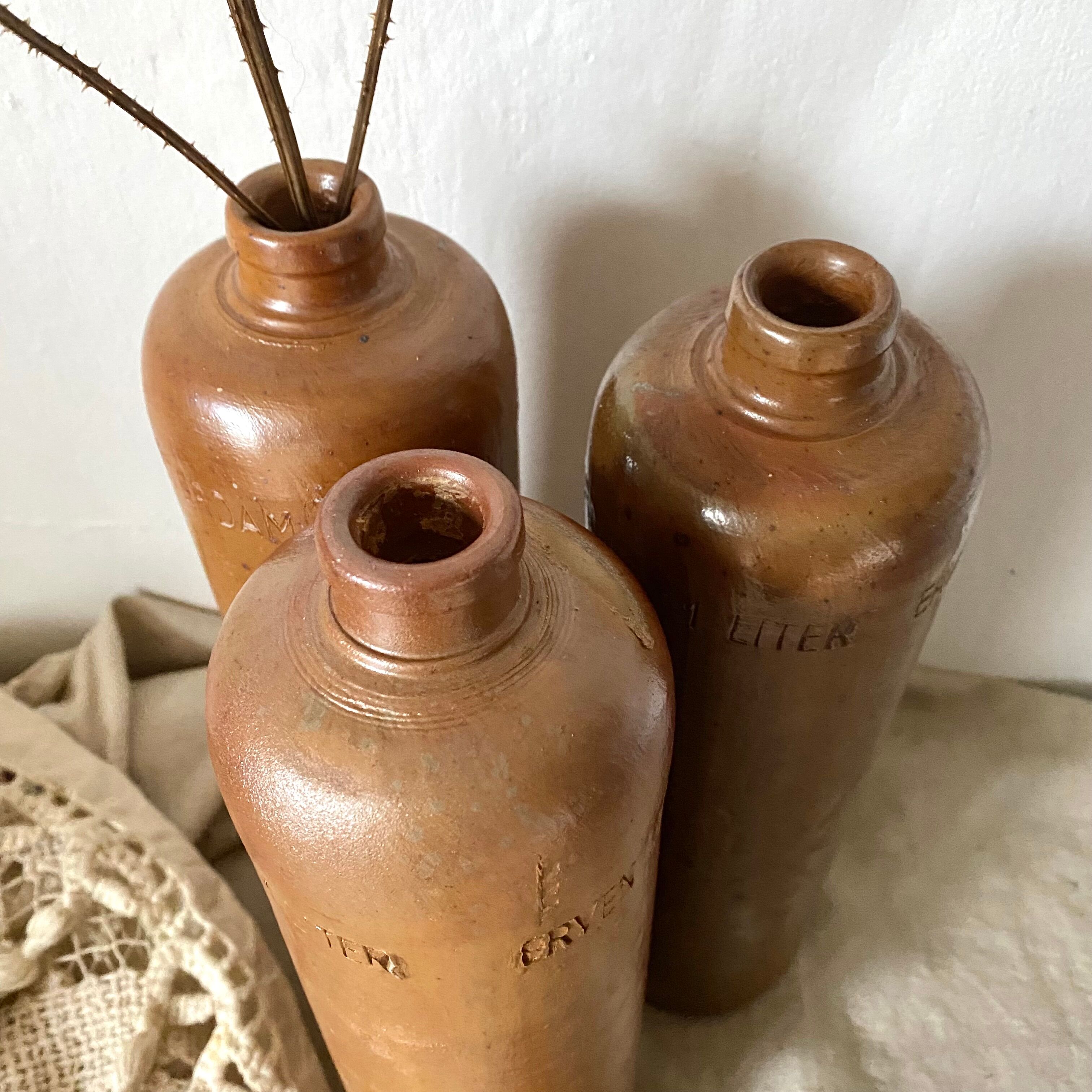 Antique stoneware bottles Erven Lucas Bols Het Lootsje Amsterdam