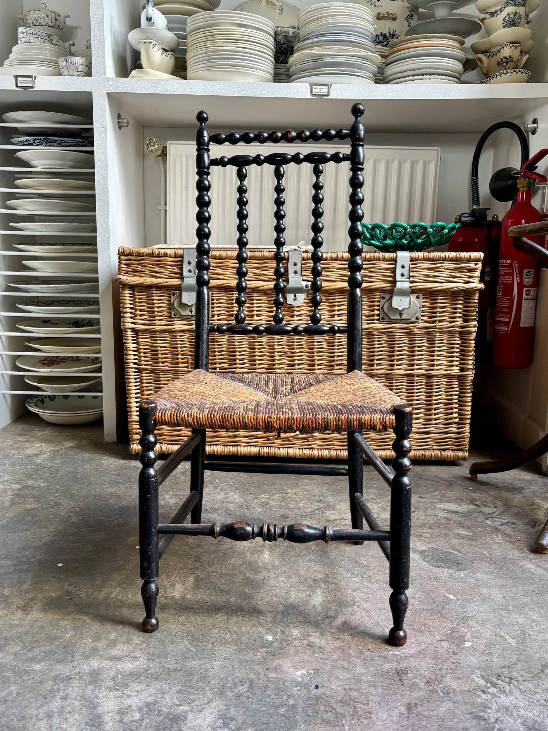Low chair, Napoléon III child in blackened wood and woven straw.