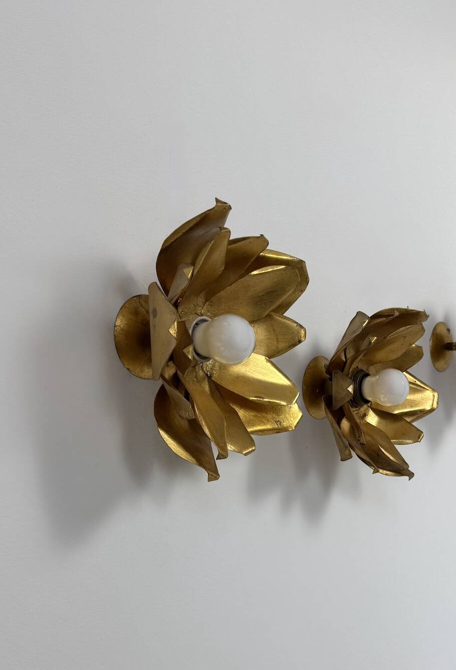 Pair of vintage flower wall lights, gilded metal, France, 1970.
