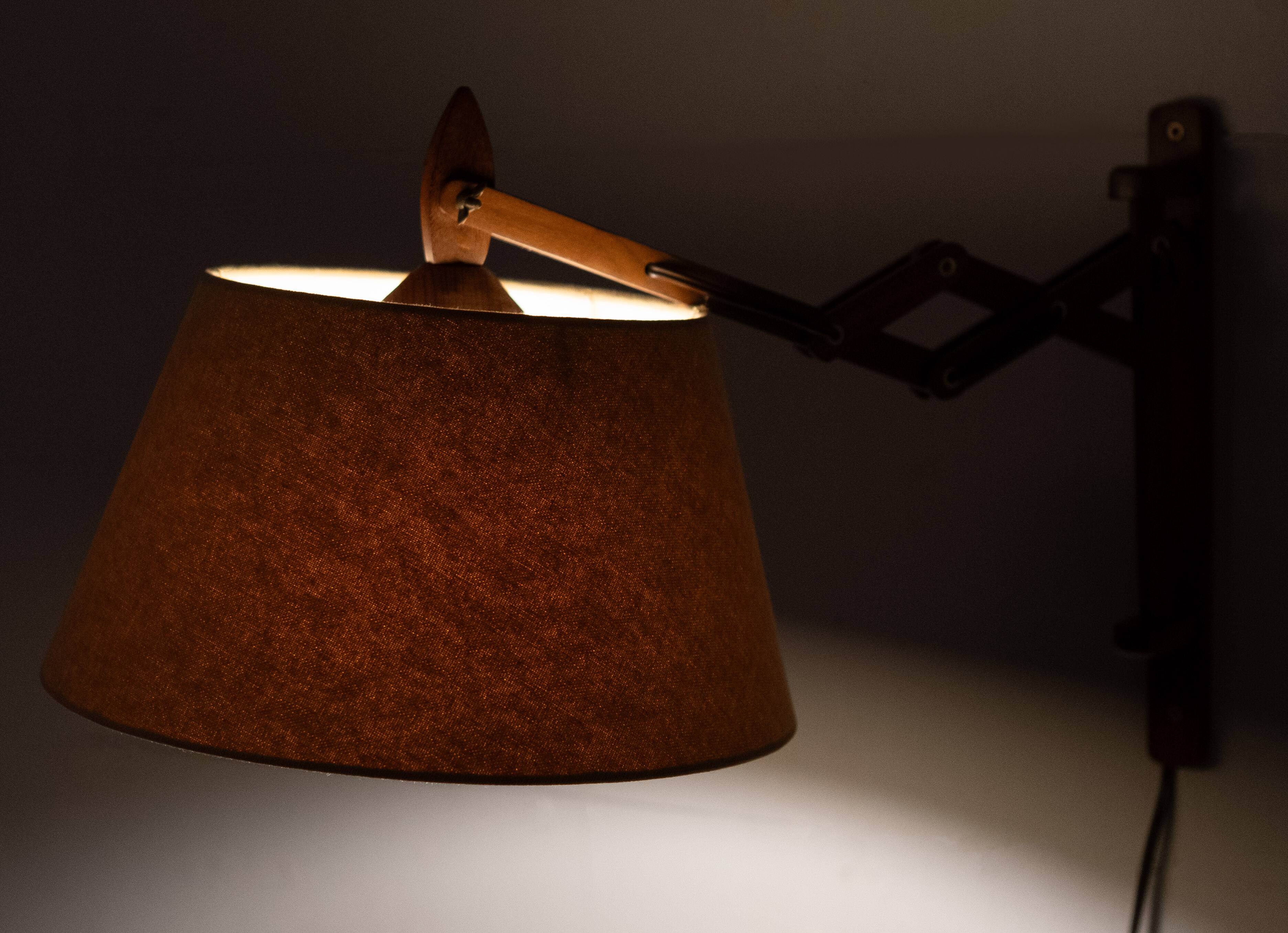 Small teak scissors wall lamp 1960s holland