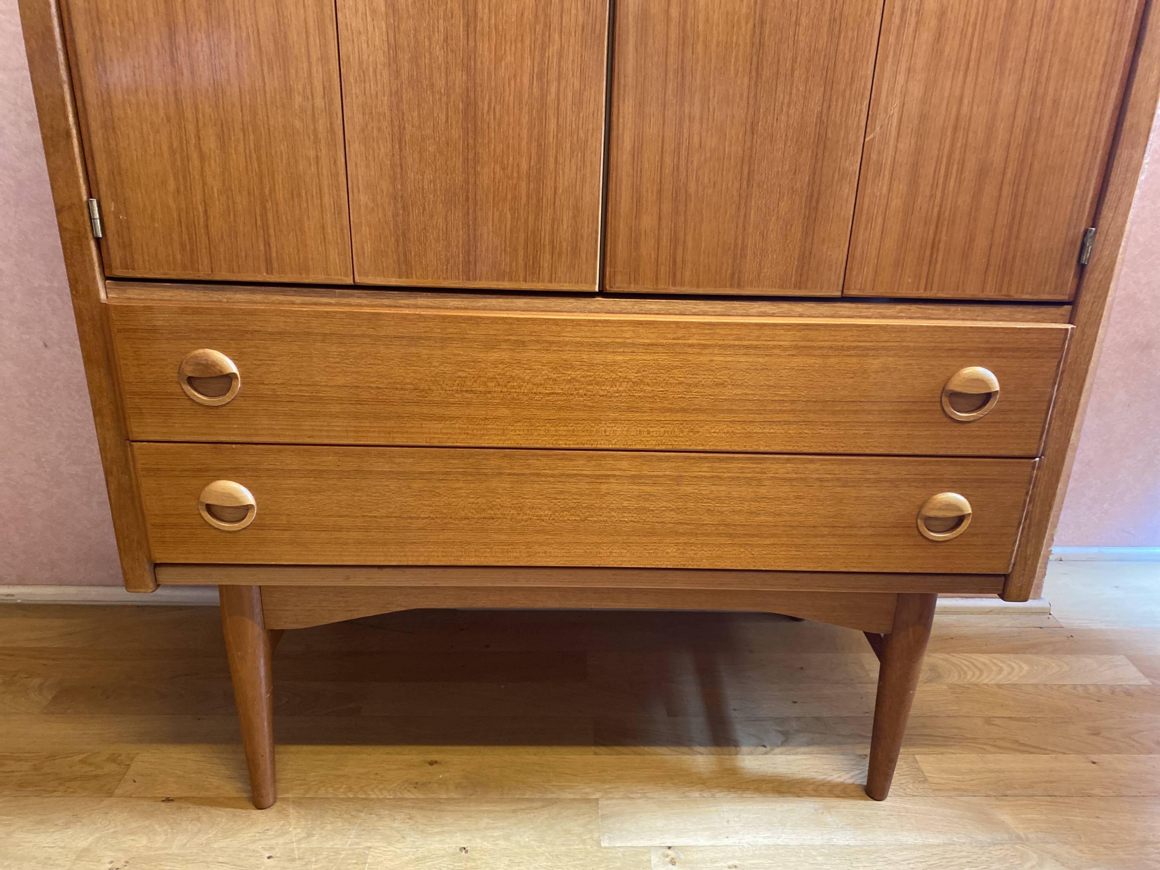 TV stand from the 50s, 2 drawer, 2 accordion doors. Perfect condition.