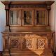 Two-body buffet, made of richly carved solid walnut.