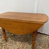 Table ronde à rabats en châtaignier