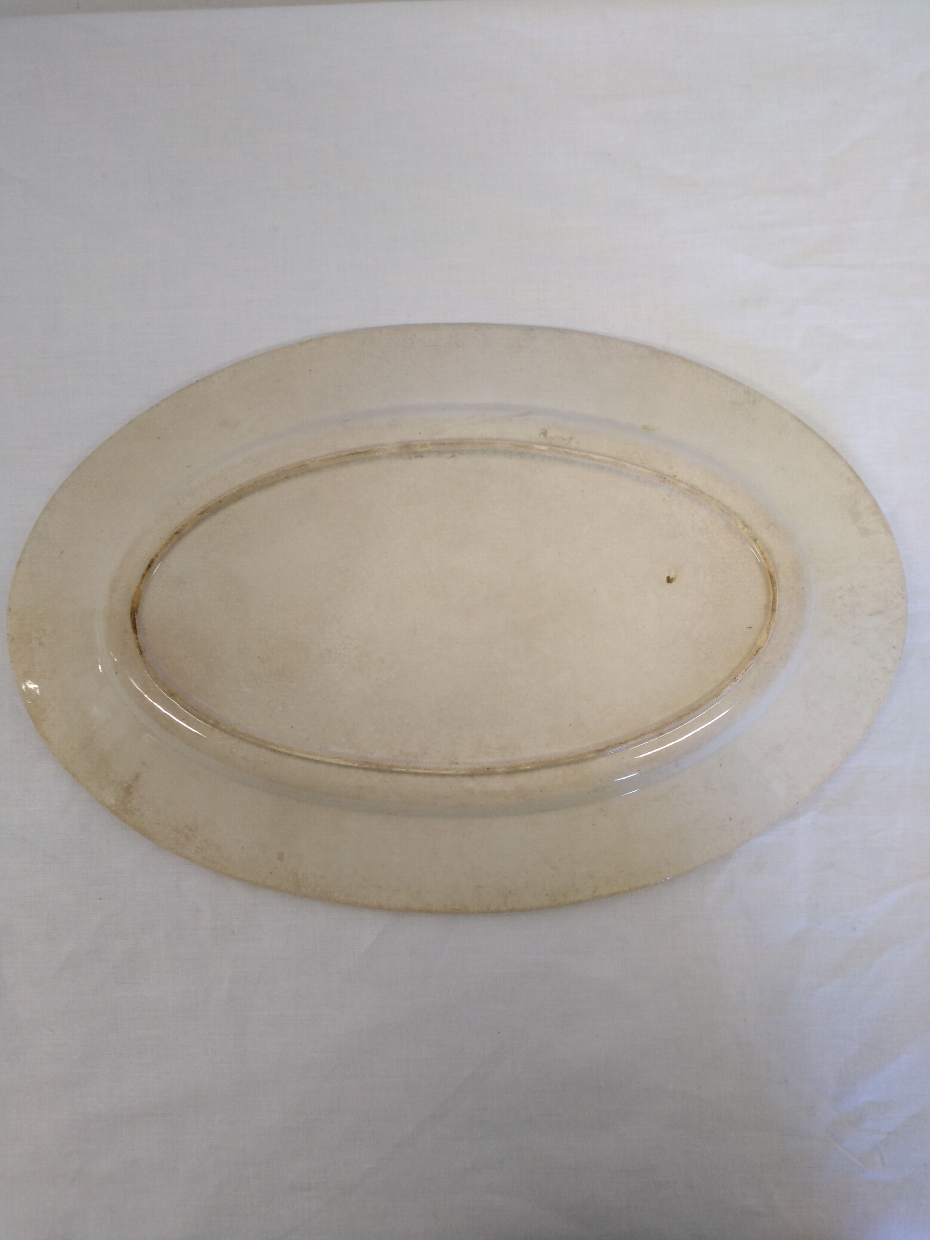 Old serving dish floral and maritime decoration