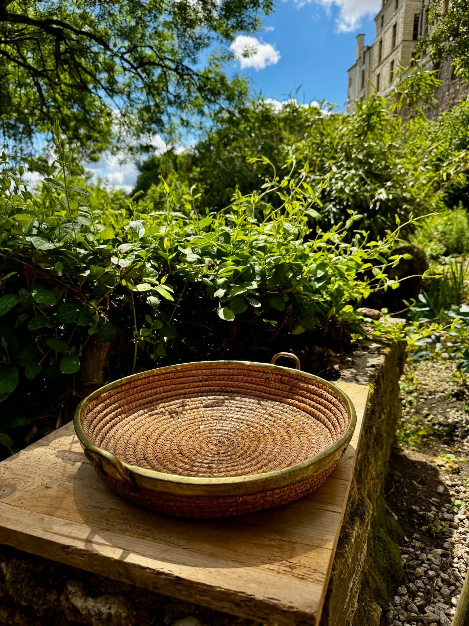 Wicker and brass table centrepiece in the style of Gabriella Crespi from the 1960s.
