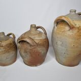 Set of three ancient ladies-jeannes in enamelled terracotta
