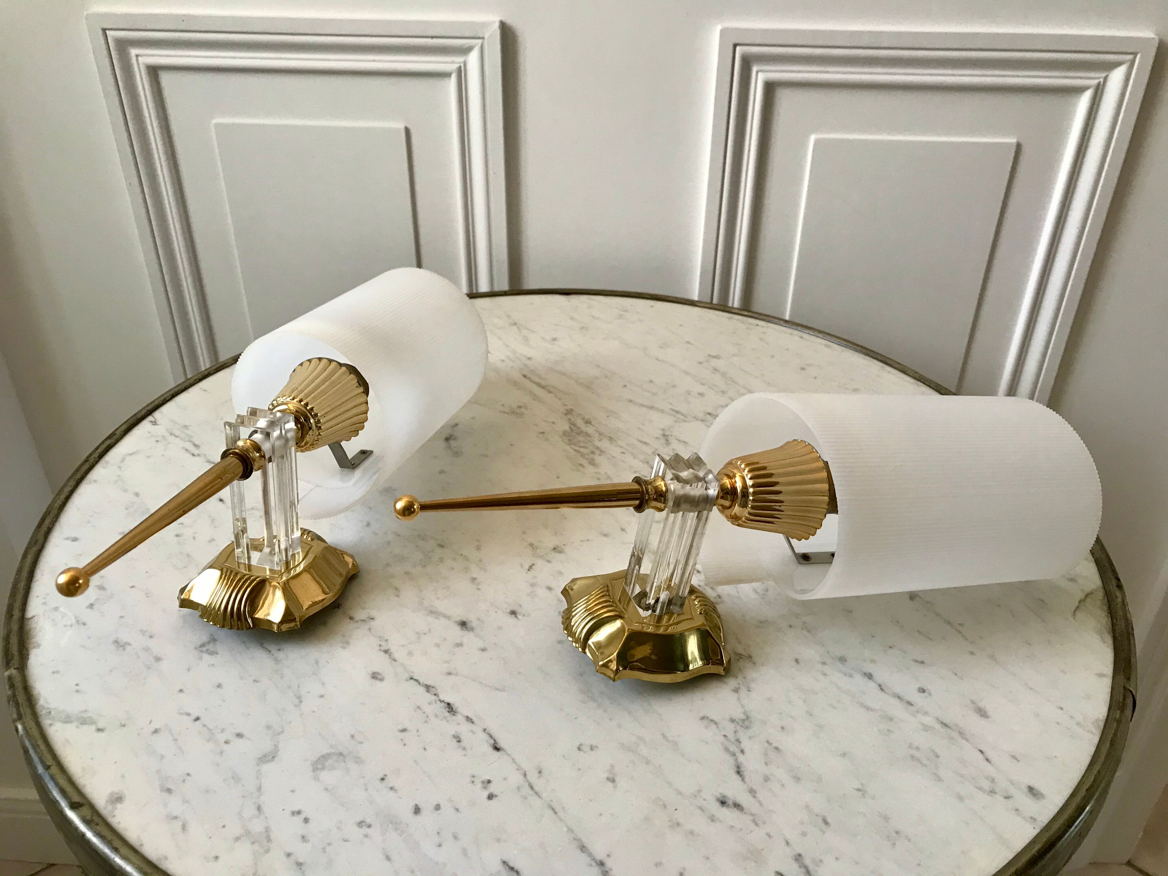 Pair of gold steel wall lamps, plexi and pleated plastic shades 60s-70s