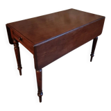 Antique English drop-leaf table in mahogany, late 19th century.