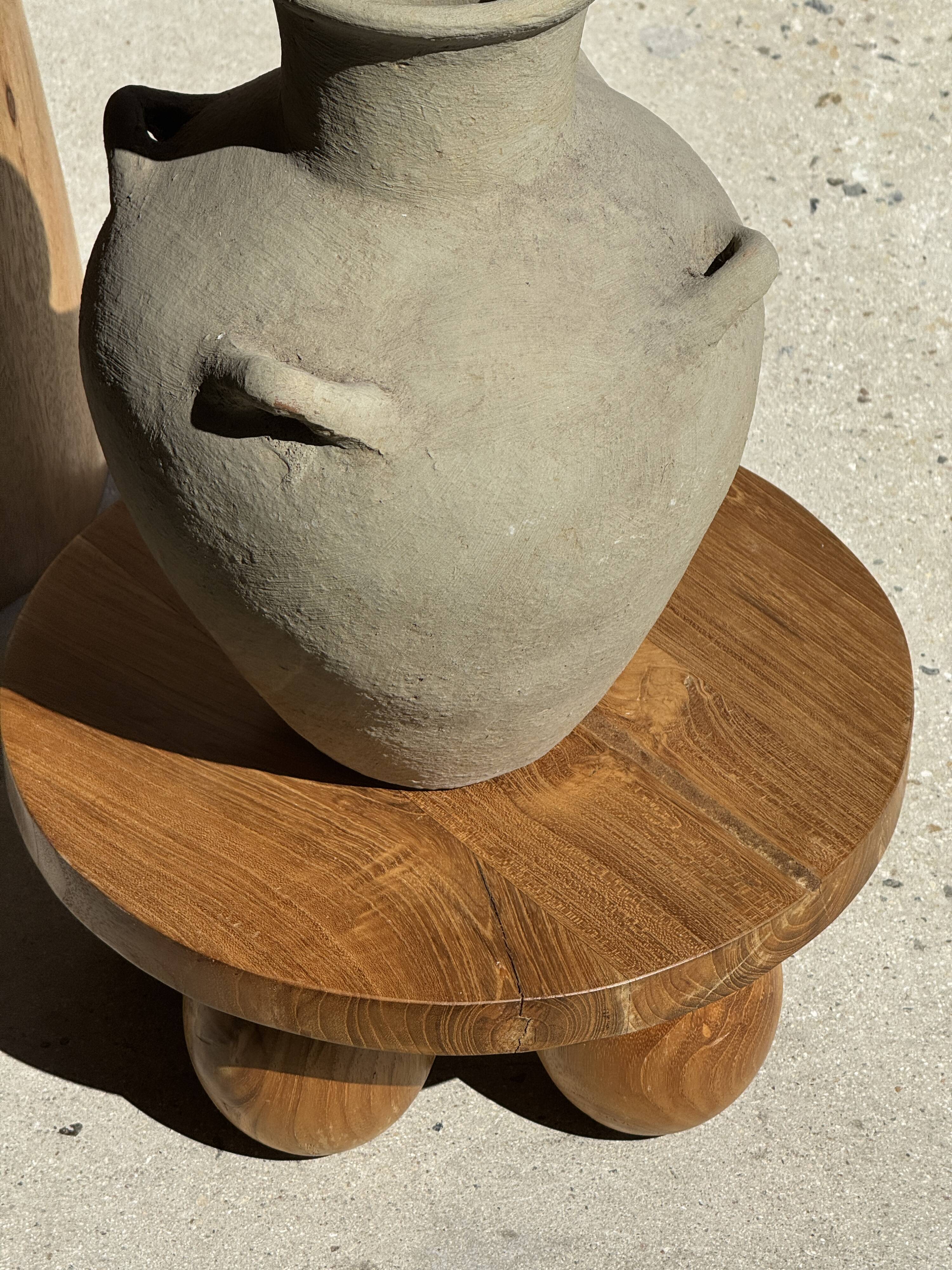 Mini minimalist stool with ball feet in teak H15 D35