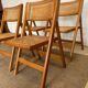 Quatre chaises pliantes cannées 1970