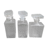 3 glass whiskey bottles
