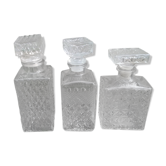 3 glass whiskey bottles