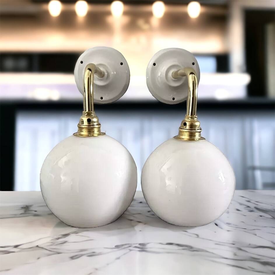 Pair of white opaline sconces