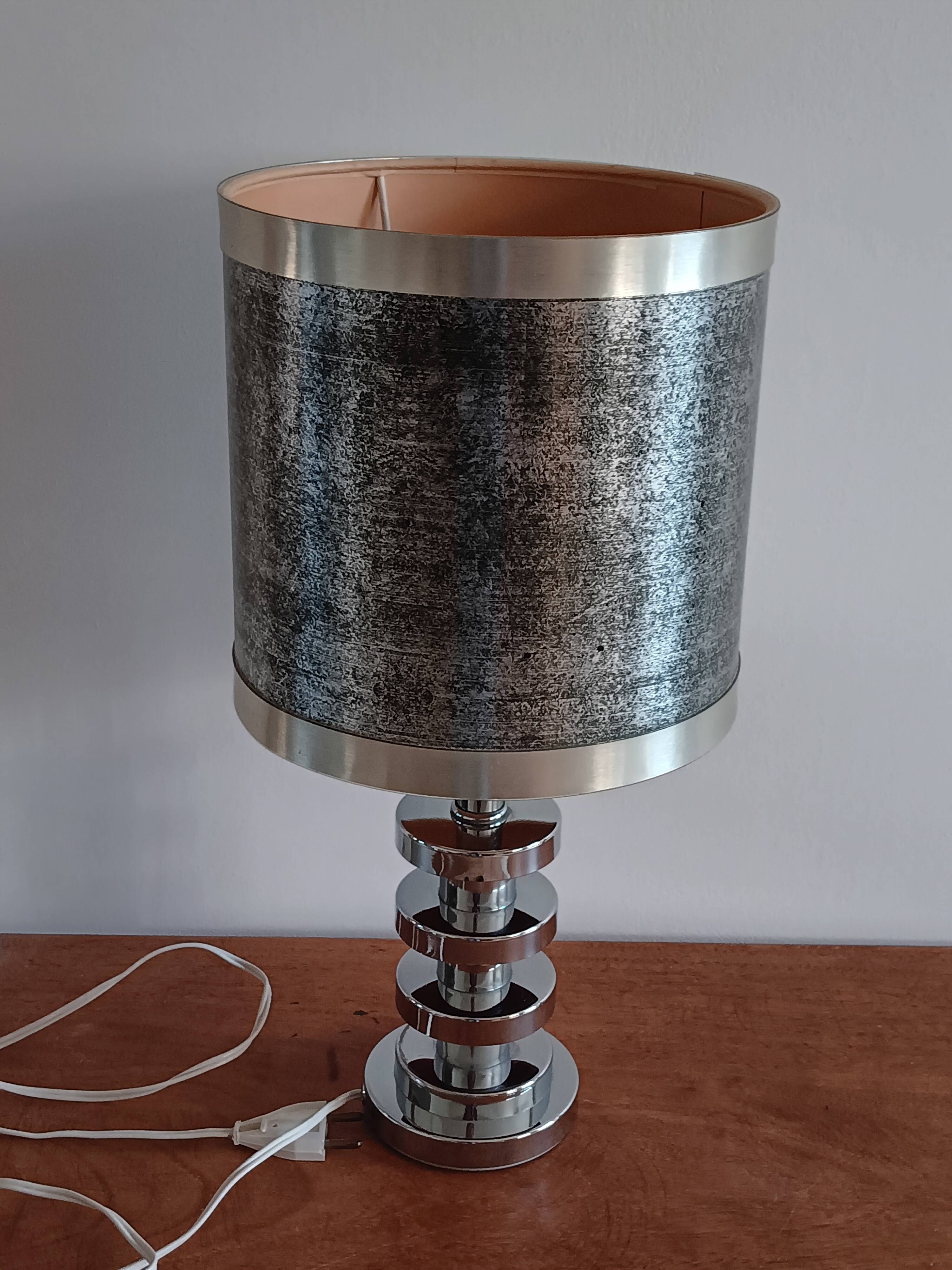 Chromed metal lamp and metallic paper lampshade. 70s