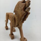 Articulated wooden lion