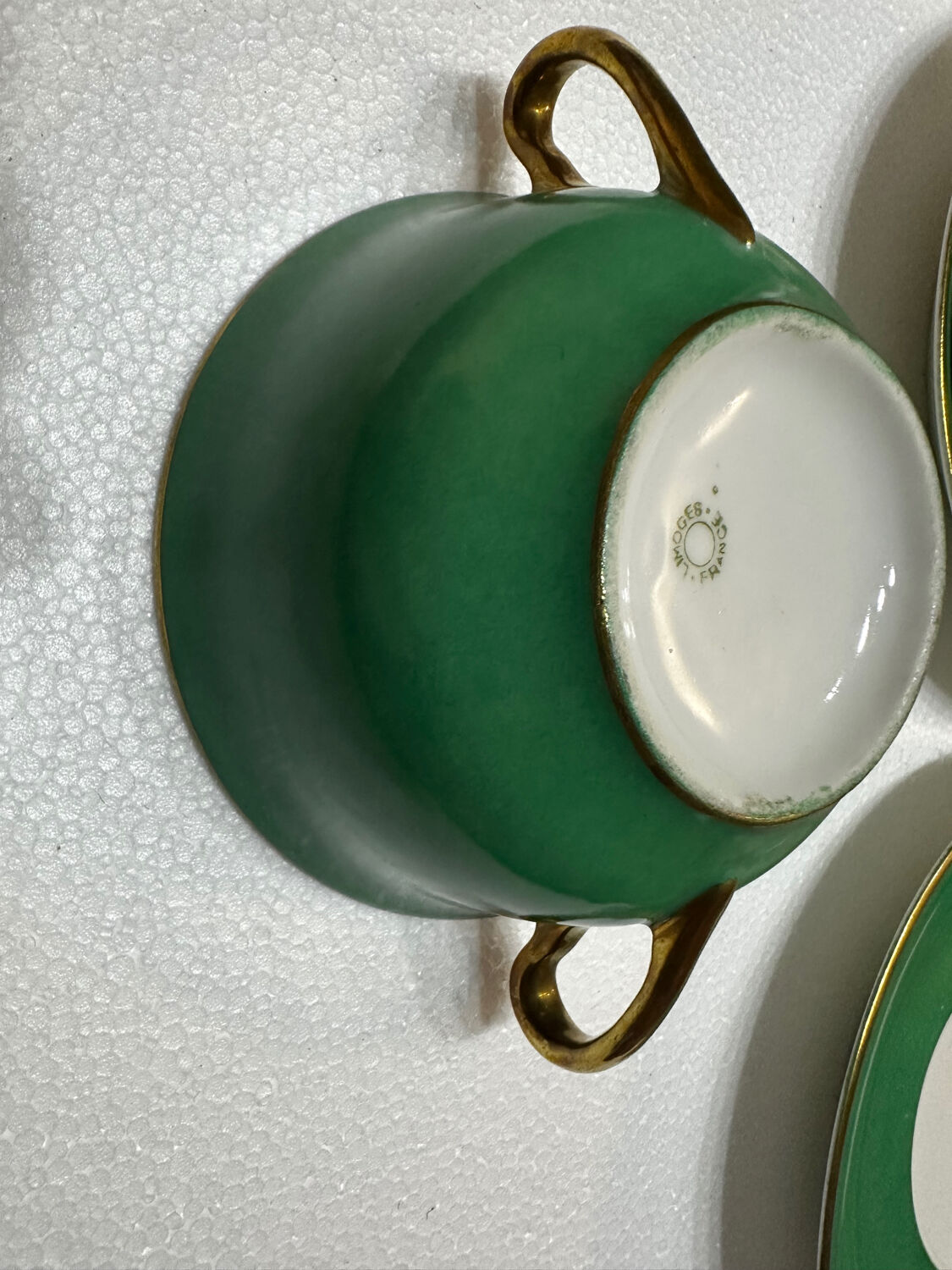 Service 14 cup and saucer in Art Deco Emerald Green and Gold.