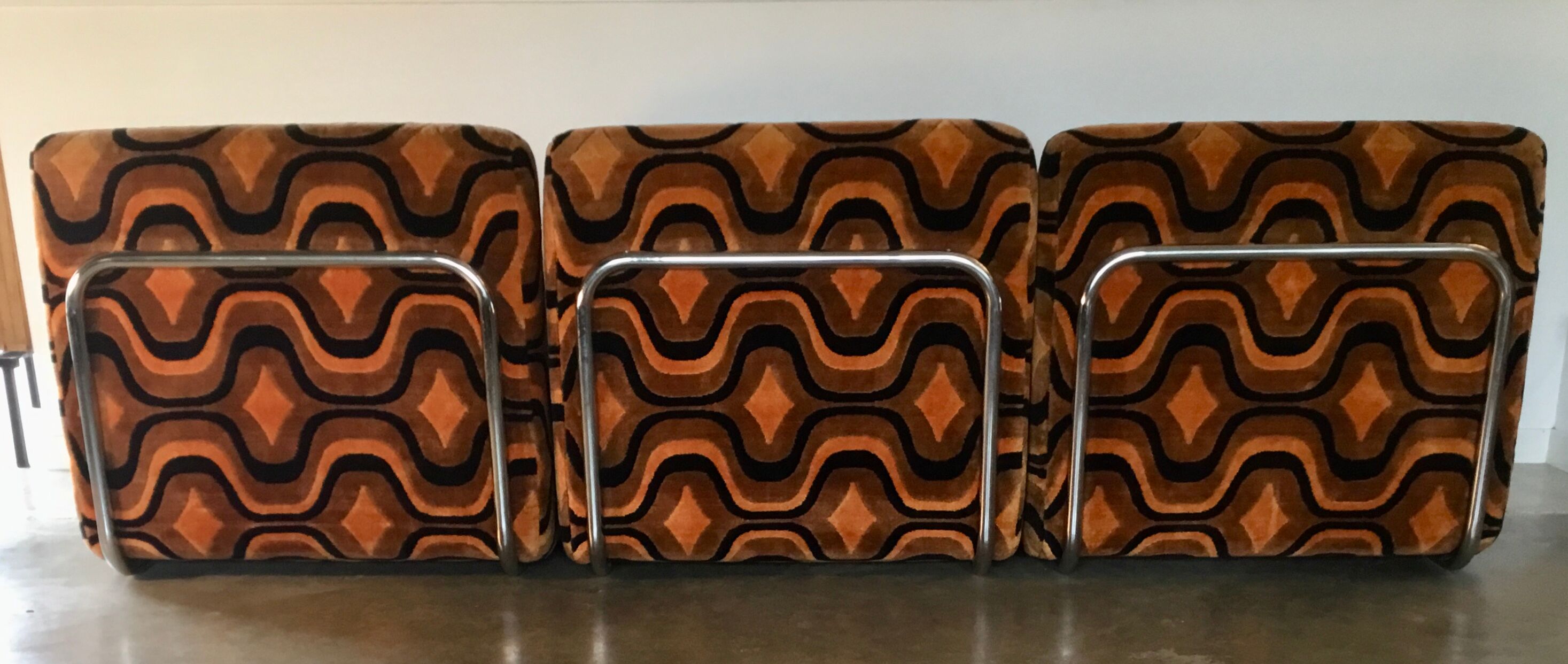 Vintage 1970s orange geometric patterned space-age armchair