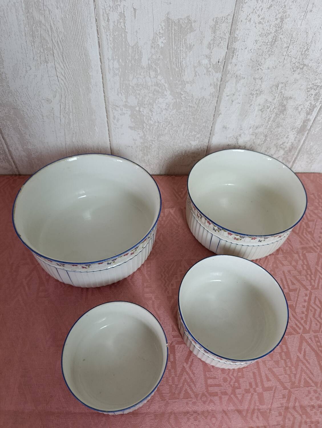 Nested porcelain salad bowls decorated