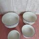 Nested porcelain salad bowls decorated