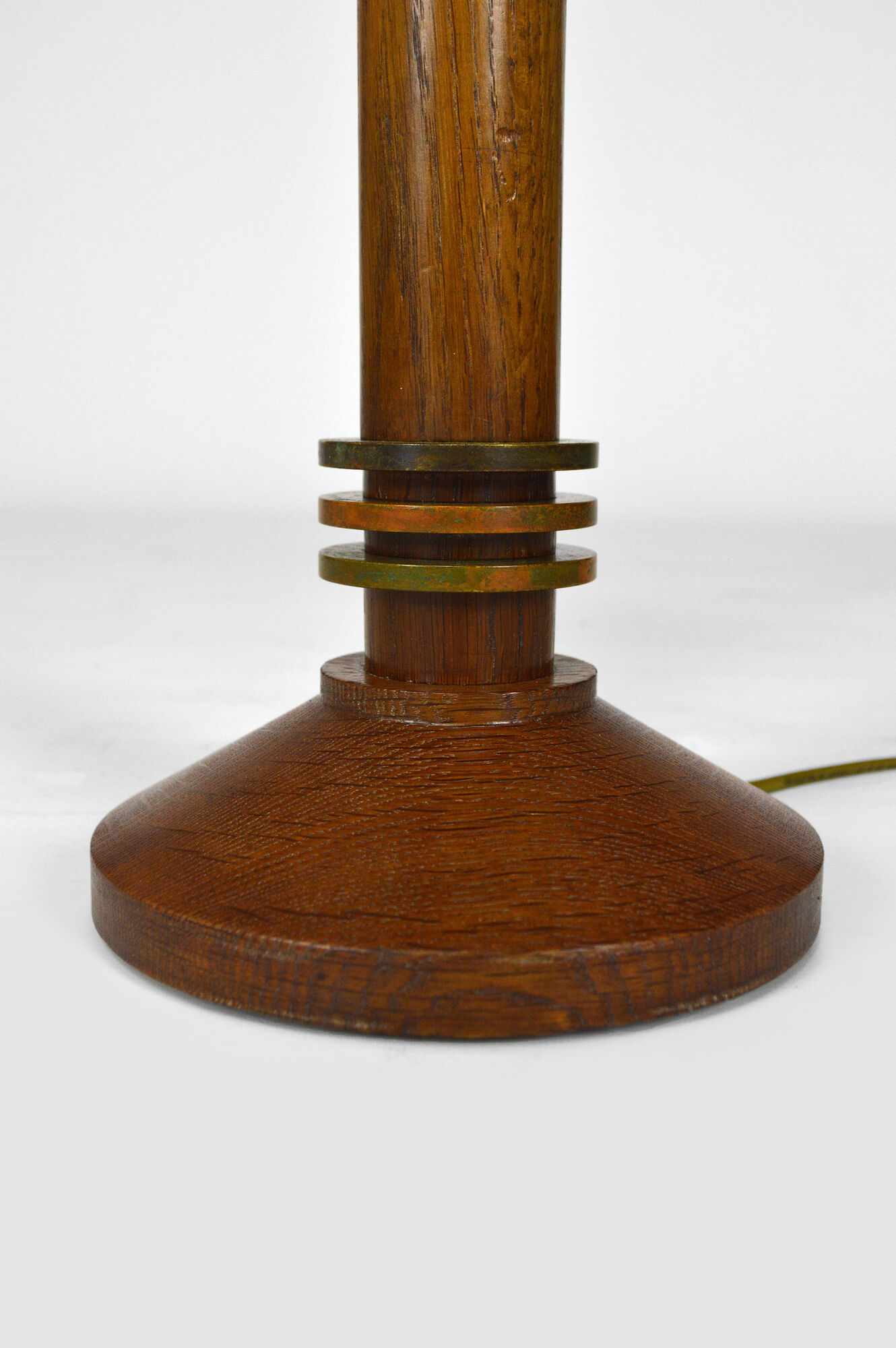 Pair of art deco lamps in wood and patinated bronze around 1930