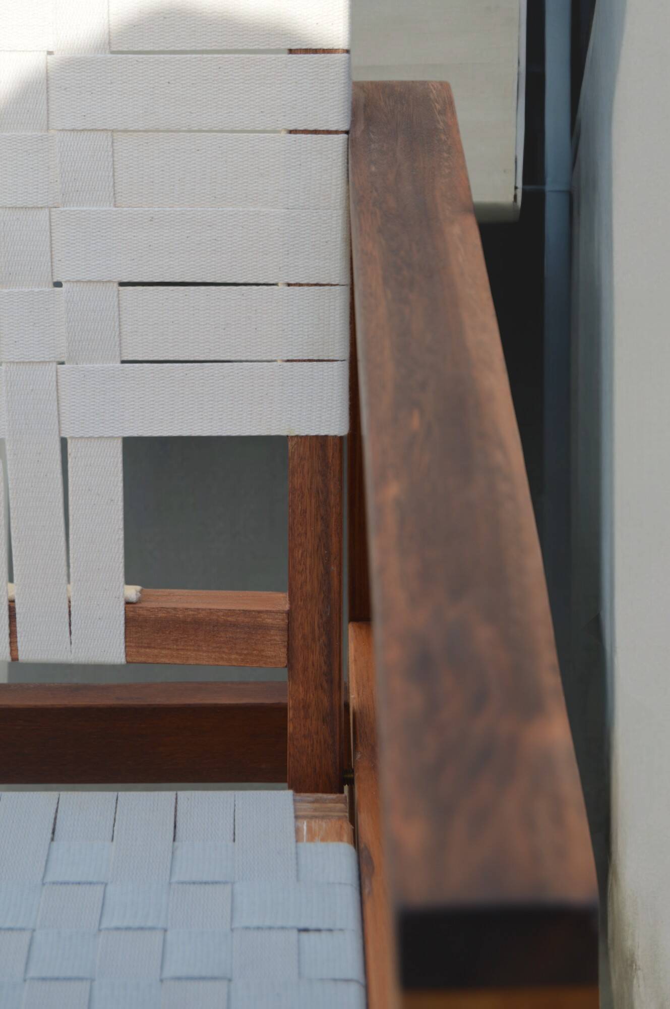 Teak armchair with woven seat