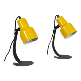 A pair of well-designed minimalist bedside lamps.