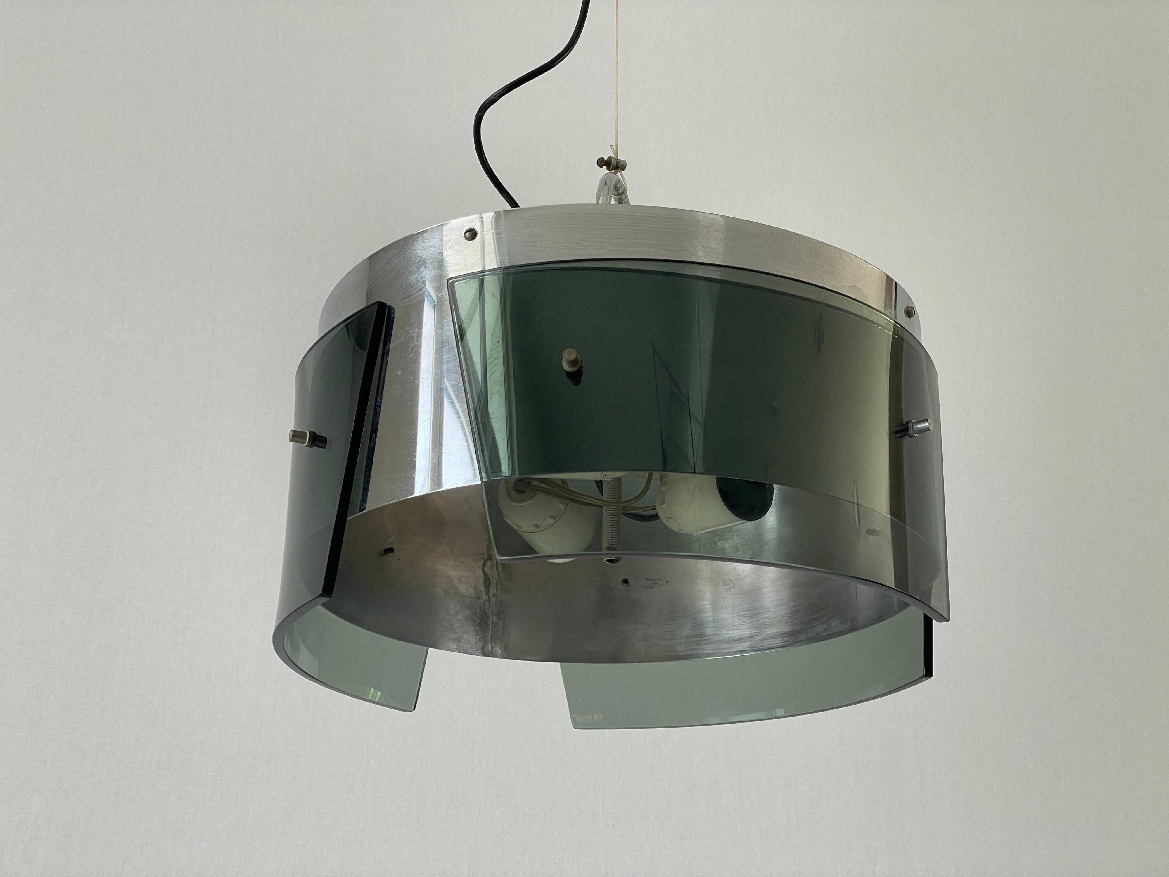 Suspended lamp in green glass and chrome, 1960s, Italy